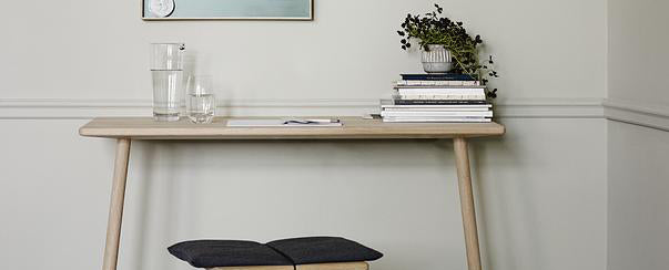 Georg Leaning Desk by Skagerak, showing front view of georg leaning desk in lives hot.