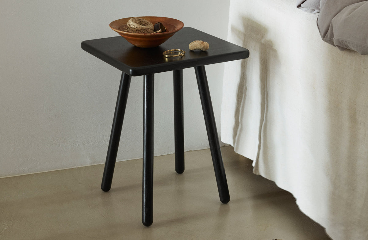 Georg Side Table by Skagerak, showing georg side table in live shot.