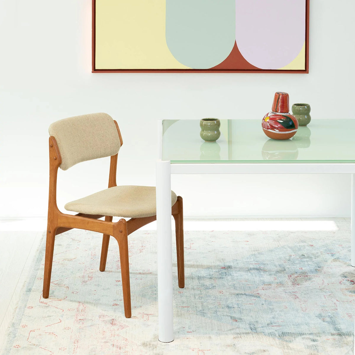 Get Together Table by Bend, showing closeup view of get together table with chair in live shot.