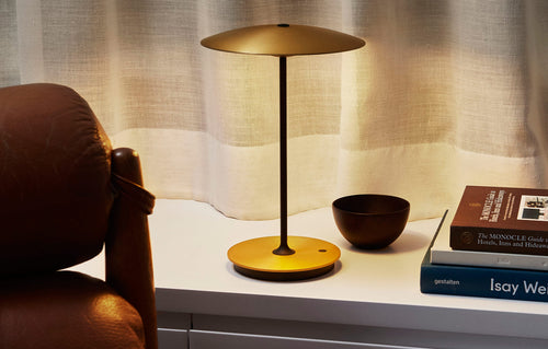 Ginger Portable Table Lamp by Marset, showing ginger portable table lamp in live shot.