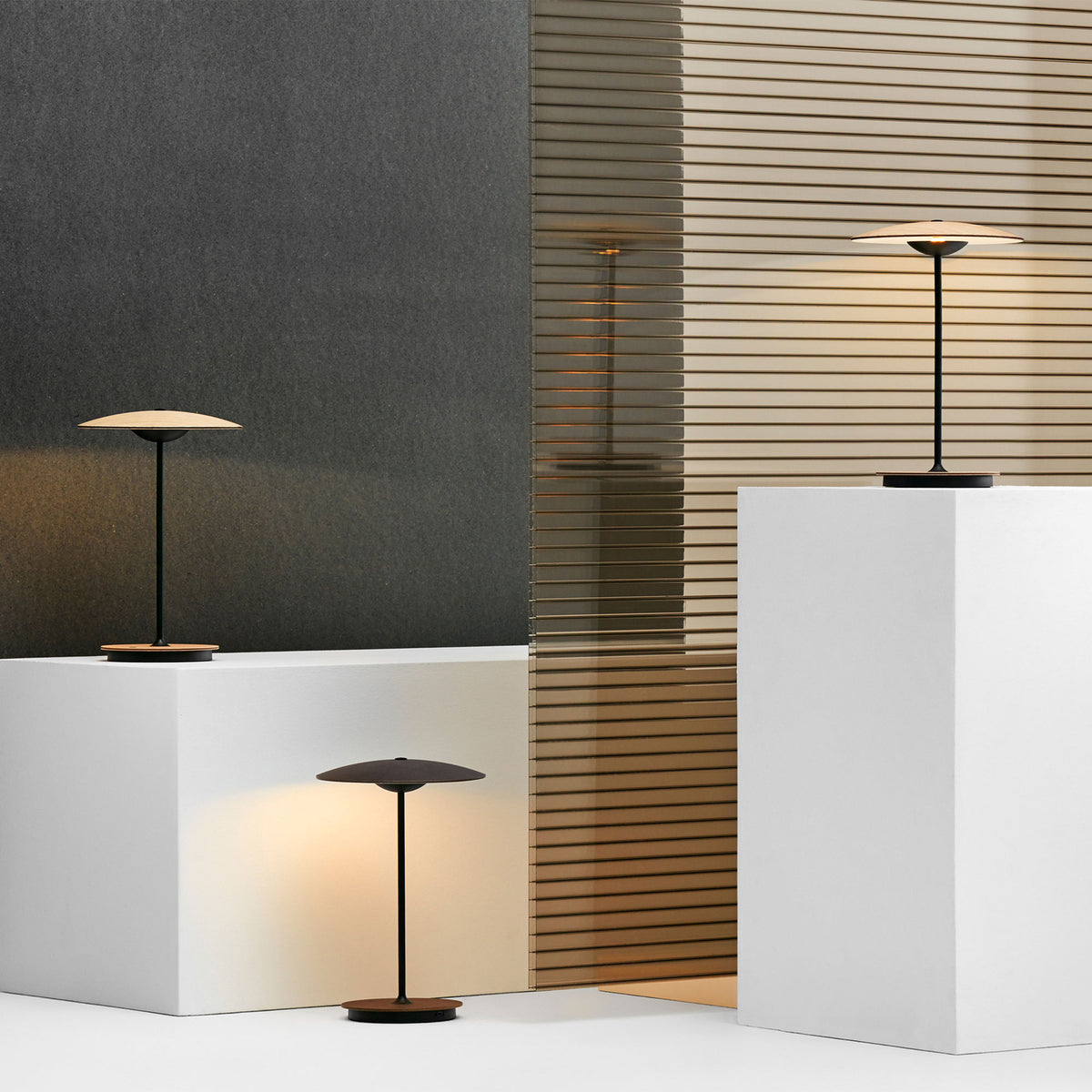 Ginger Portable Table Lamp by Marset, showing ginger portable table lamps in live shot.