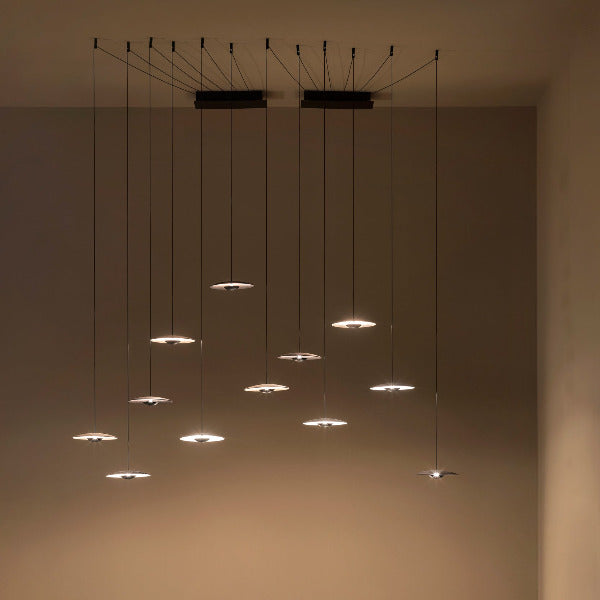 Ginger 20V/20V Pendant Light (set of 3) by Marset, showing ginger 20V/20Vx3 pendants in live shot.