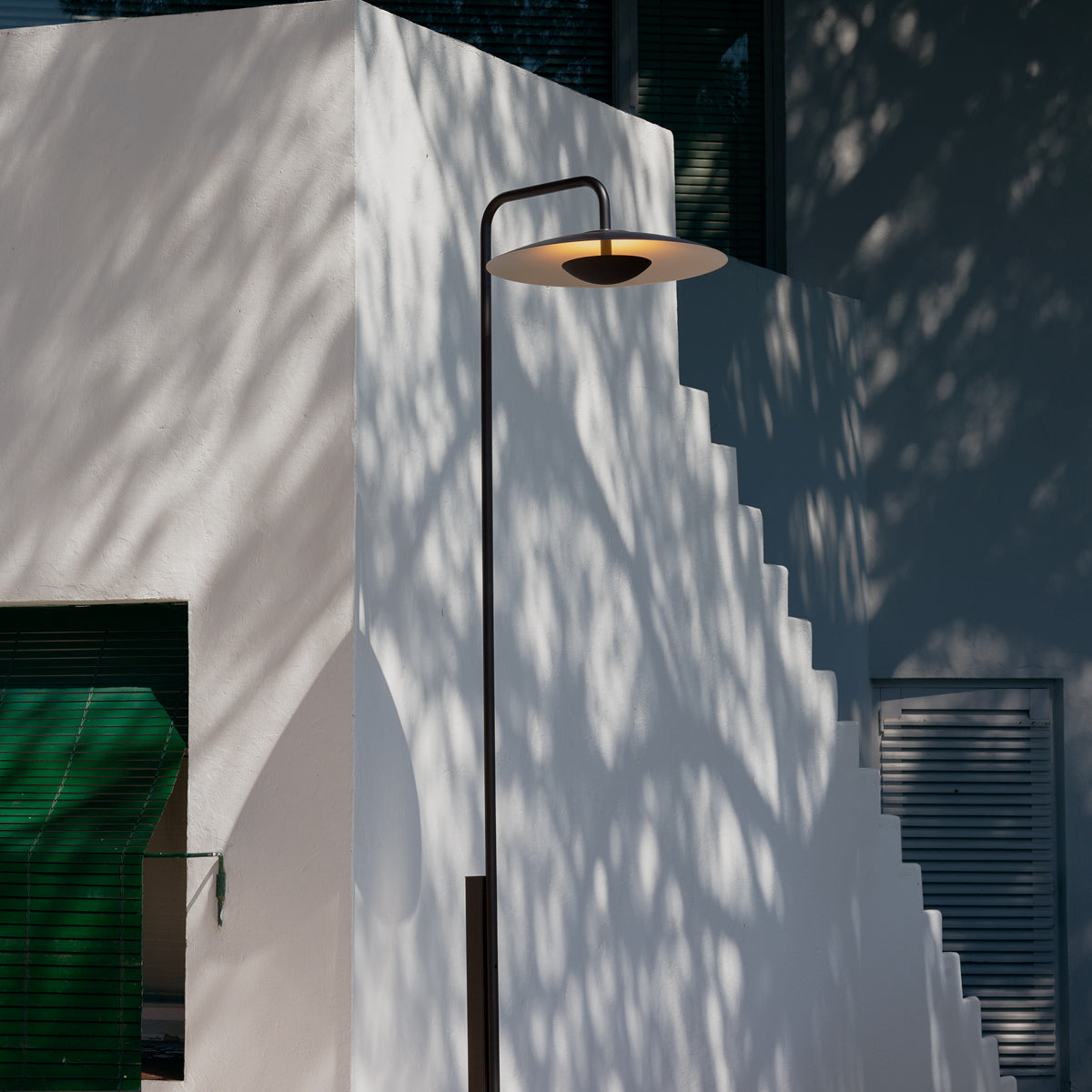 Ginger 60 Lamppost Outdoor Light by Marset, showing ginger 60 lamppost outdoor light in live shot.