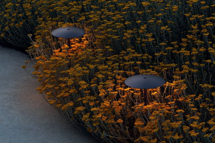 Ginger Bollard Outdoor Light by Marset, showing ginger bollard outdoor lights in live shot.