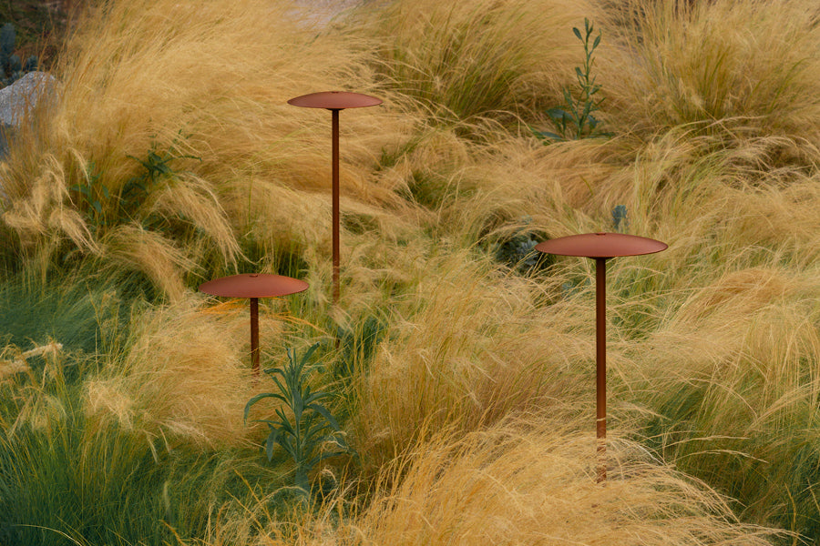 Ginger Bollard Outdoor Light by Marset, showing ginger bollard outdoor lights in live shot.