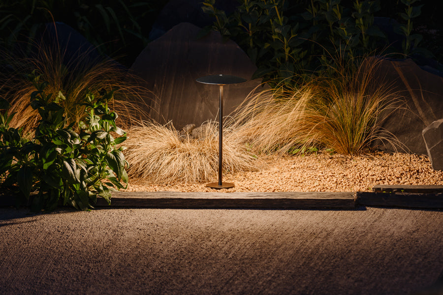 Ginger Bollard Outdoor Light by Marset, showing ginger bollard outdoor light in live shot.