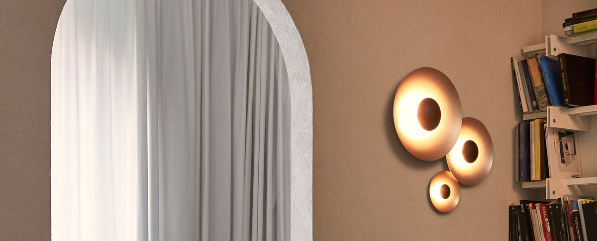 Ginger Dual Dimmable Wall Sconce by Marset, showing ginger dual dimmable wall sconces in live shot.