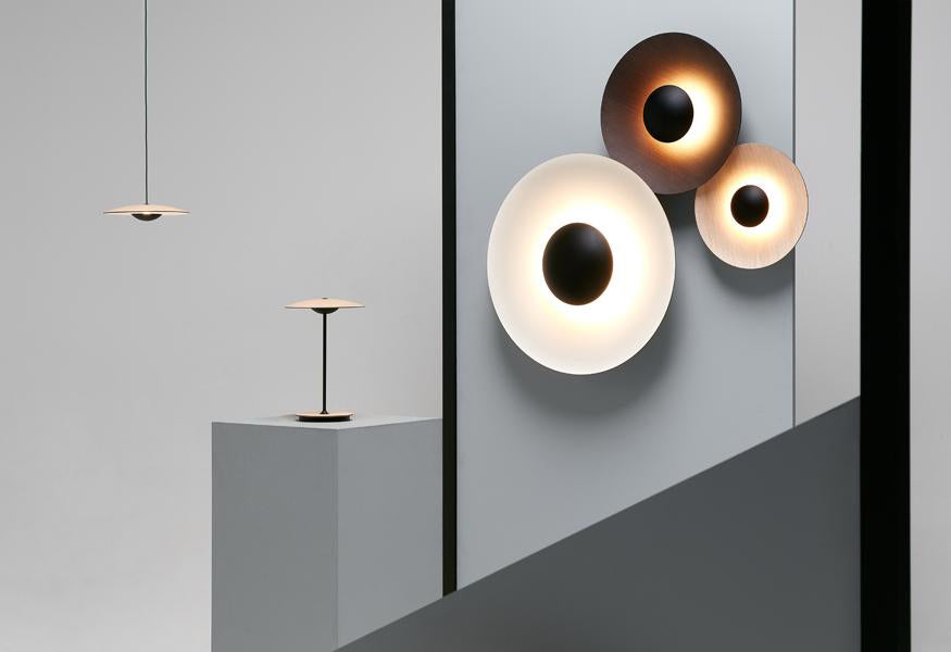 Ginger Dual Dimmable Wall Sconce by Marset, showing ginger dual dimmable wall sconces in live shot.