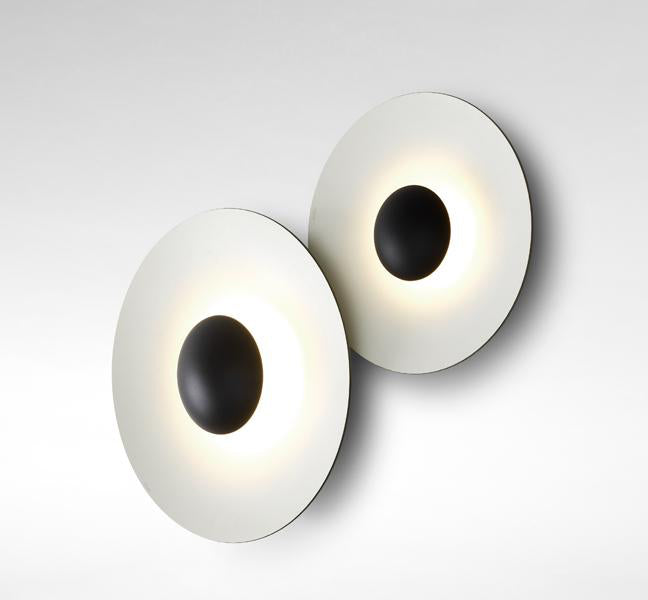 Ginger Dual Dimmable Wall Sconce by Marset, showing ginger dual dimmable wall sconces in live shot.