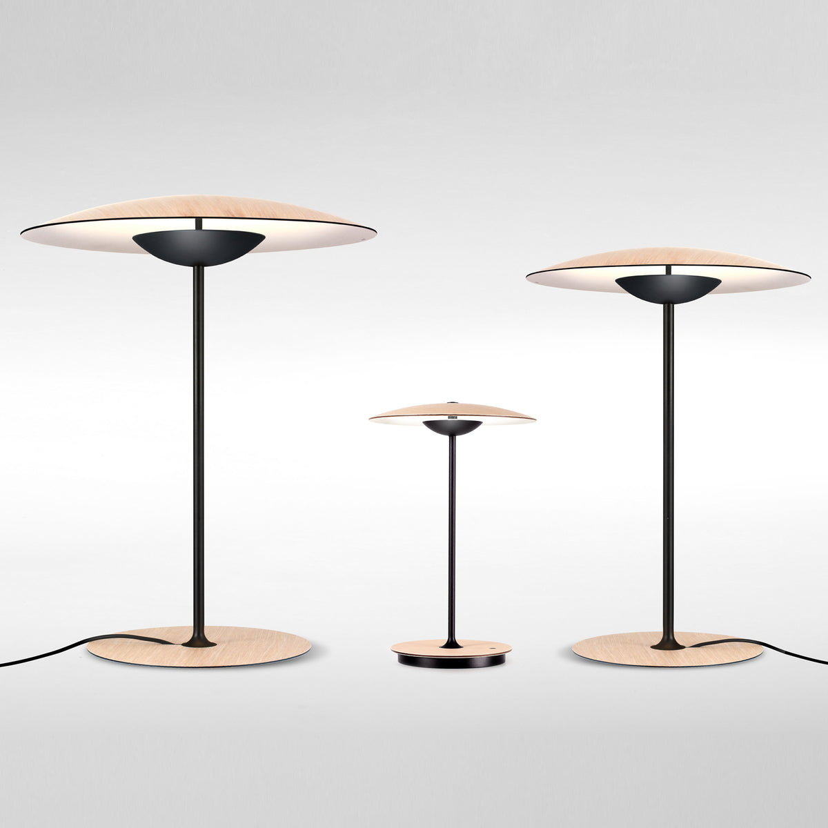 Ginger Table Lamp by Marset, showing ginger table lamps with ginger portable lamp in live shot.