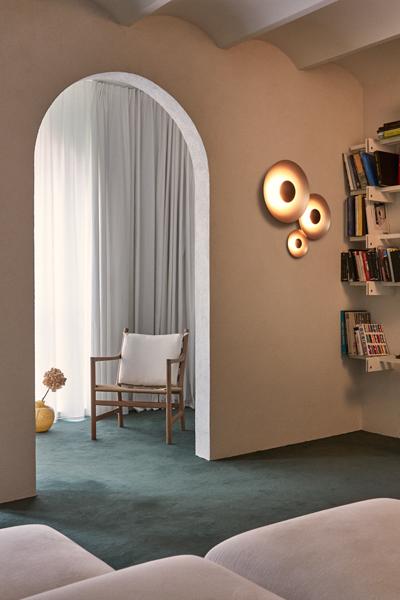 Ginger Wall Sconce by Marset, showing ginger wall sconce in live shot.