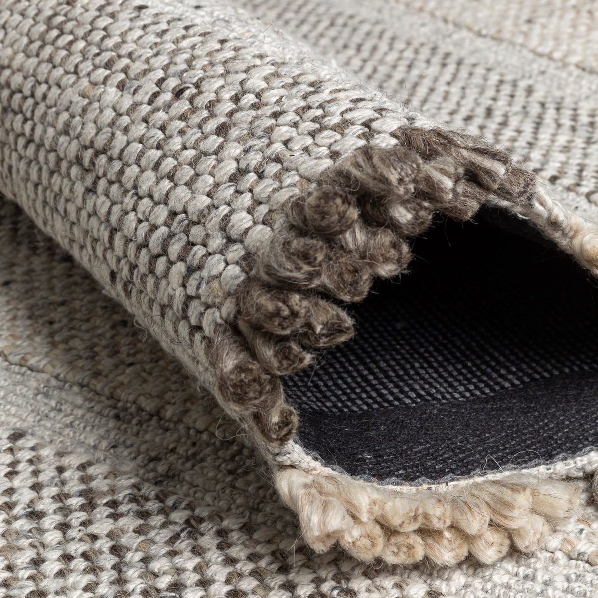 Grade 241.001.900 Hand Woven Rug by Ligne Pure, showing closeup view of grade hand woven rug.