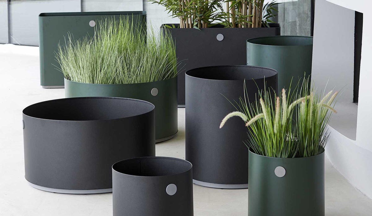 Grow Planter by Cane-line, showing grow planters in the live shot.