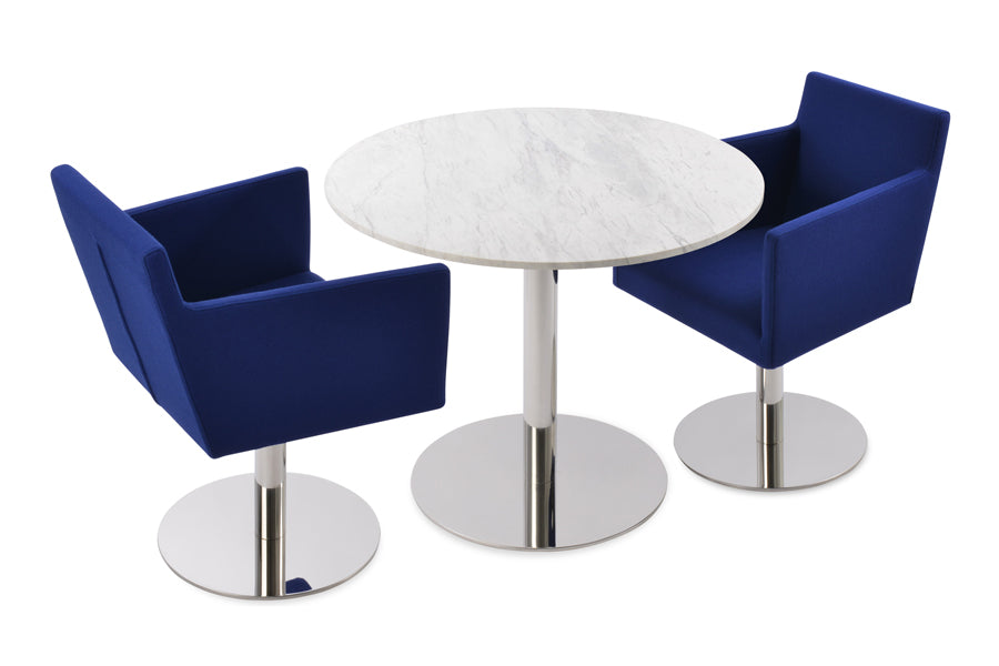 Harput Round Swivel Arm Chair by SohoConcept, showing two chairs in camira blazer royal blue wool with polished stainless steel base and tango dining marble table.
