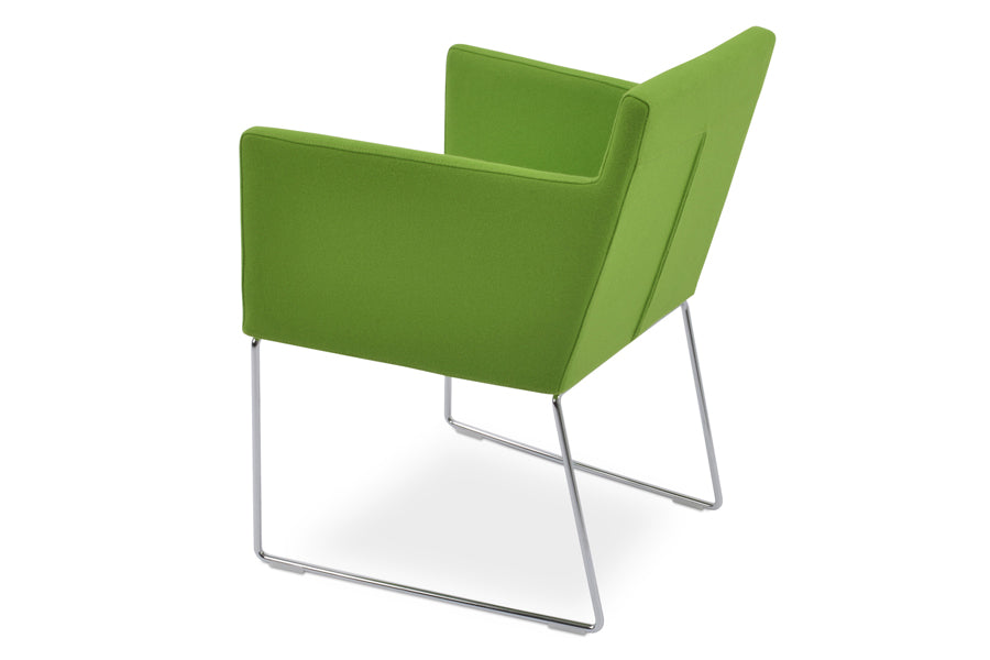 Harput Sled Wire Arm Chair by sohoConcept, showing back angle view of harput sled wire arm chair in camira blazer pistachio wool with chrome finish base.