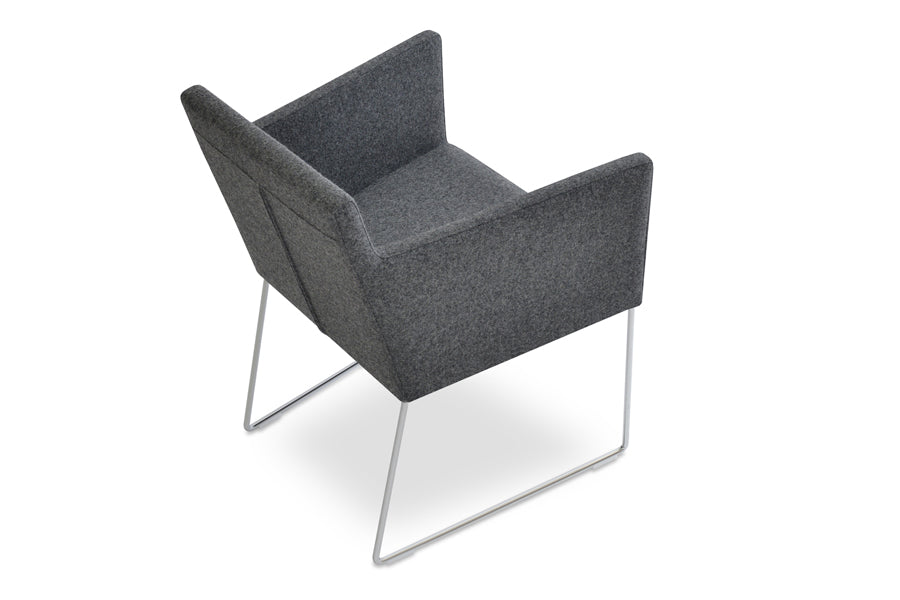 Harput Sled Wire Arm Chair by sohoConcept, shown in dark grey camira wool.
