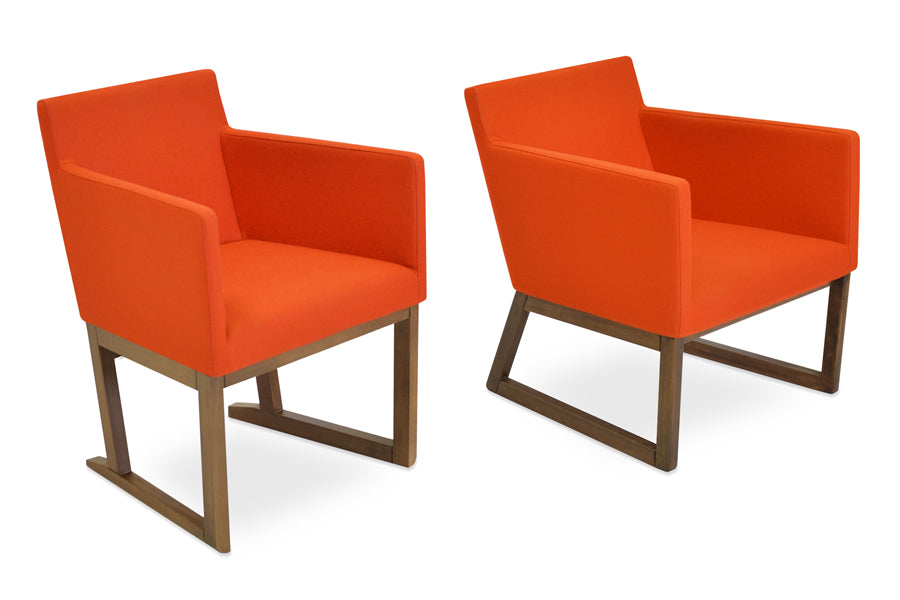 Harput Sled Wood Arm Chair by sohoConcept, showing angle view of harput sled wood arm chair in camira blazer orange wool/original walnut wood base with harput wood lounge chair.