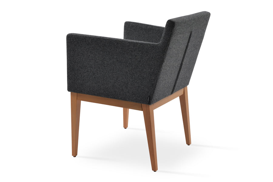 Harput Wood Arm Chair by SohoConcept, showing back angle view of wood arm chair in camira blazer dark grey wool in natural wood base.