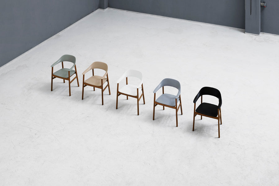 Herit Armchair by Normann Copenhagen, showing herit armchairs in live shot.