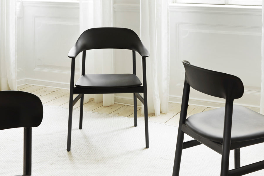 Herit Armchair by Normann Copenhagen, showing herit armchair in live shot.