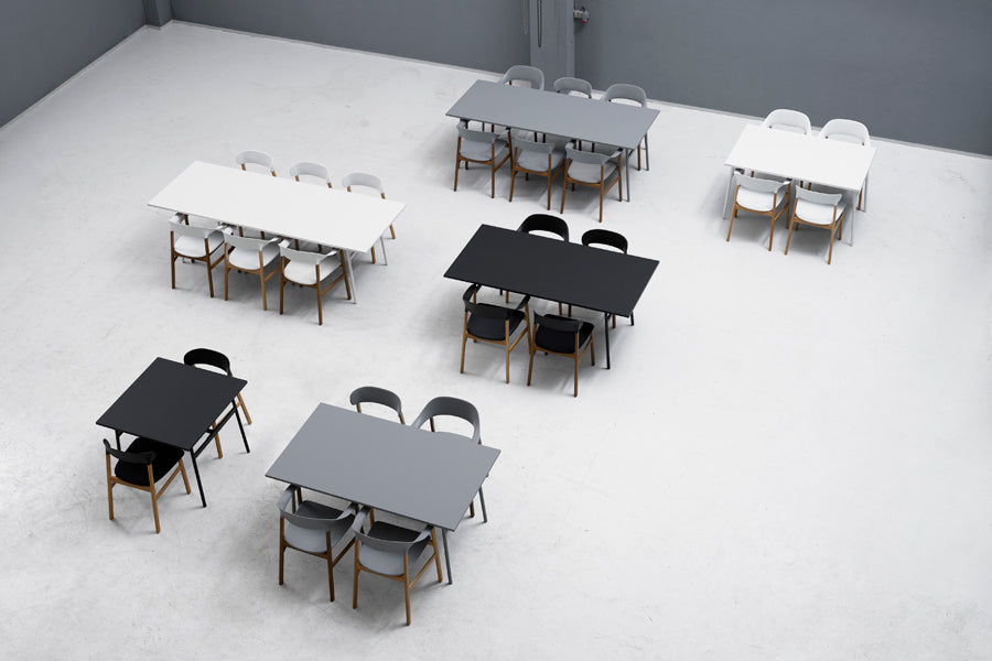 Herit Armchair by Normann Copenhagen, showing herit armchairs in live shot.