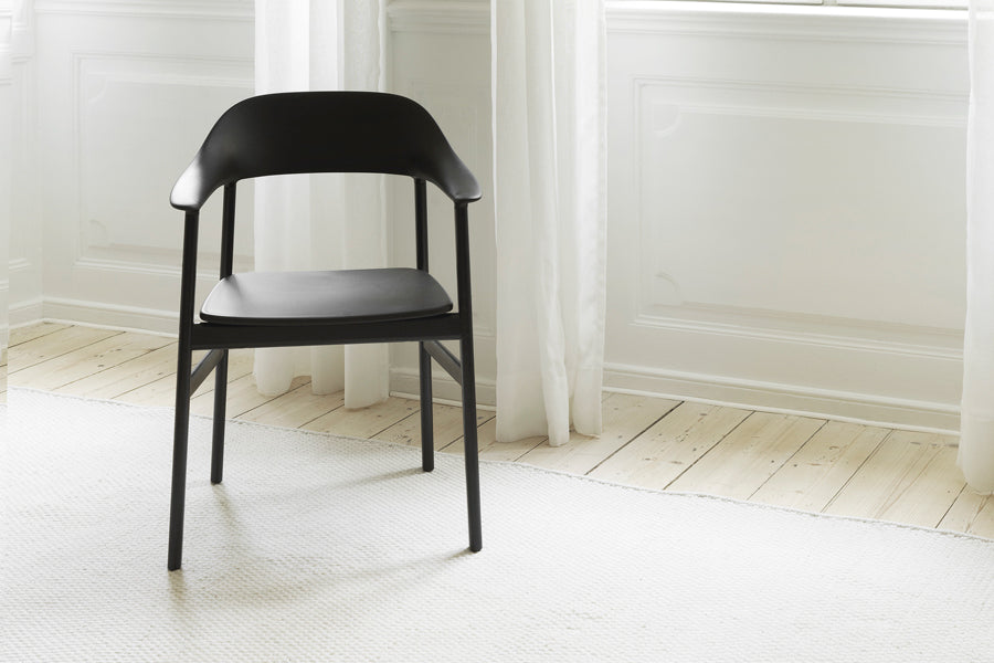 Herit Armchair by Normann Copenhagen, showing herit armchair in live shot.