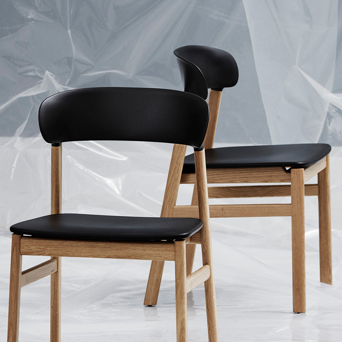 Herit Chair by Normann Copenhagen, showing herit chair in live shot.