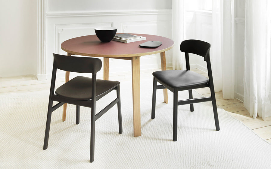 Herit Chair by Normann Copenhagen, showing herit chair in live shot.