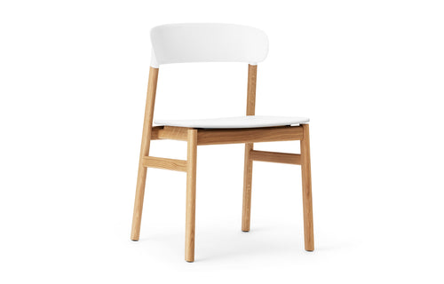 Herit Chair by Normann Copenhagen - Oak Wood Legs, White Plastic Shell Seat.