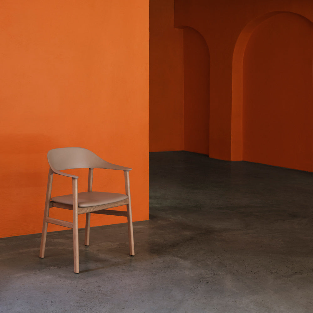 Herit Upholstery Armchair by Normann Copenhagen, showing herit upholstery armchair in live shot.