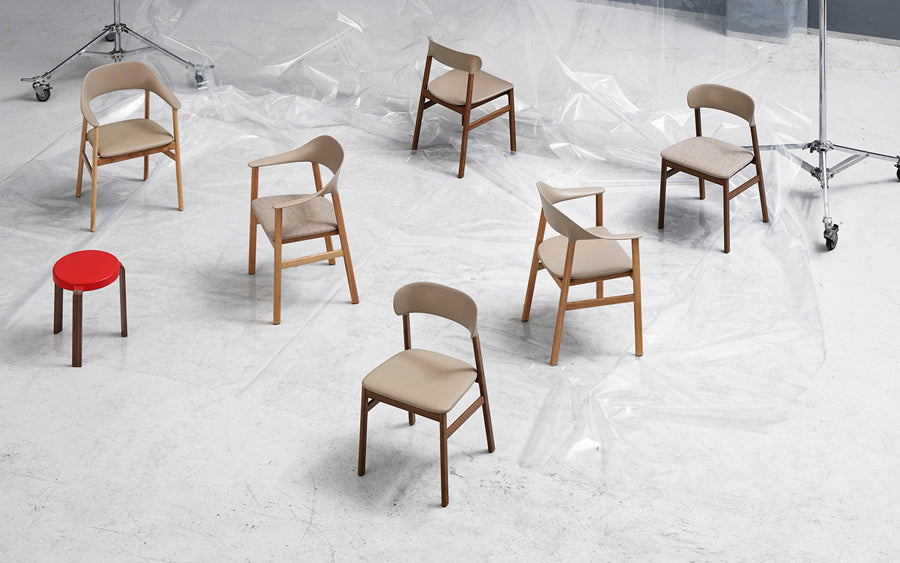 Herit Upholstery Armchair by Normann Copenhagen, showing herit upholstery armchairs in live shot.
