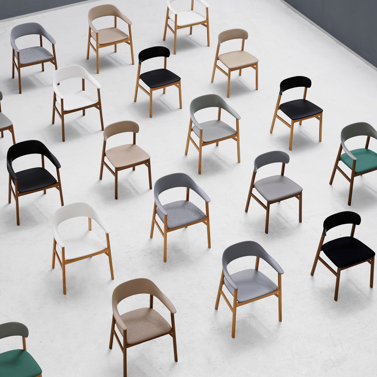 Herit Upholstery Chair by Normann Copenhagen, showing herit upholstery chairs in live shot.