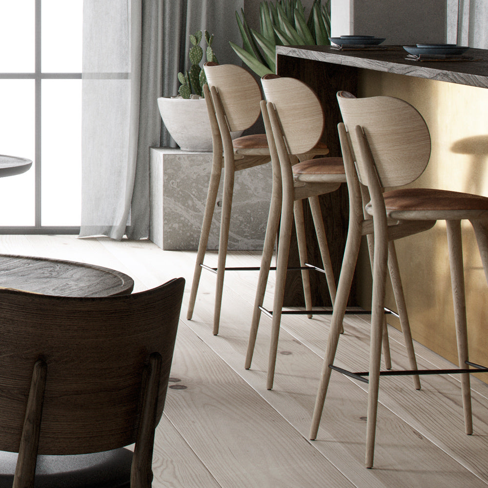 High Stool with Backrest by Mater, showing high stools with backrests in live shot.