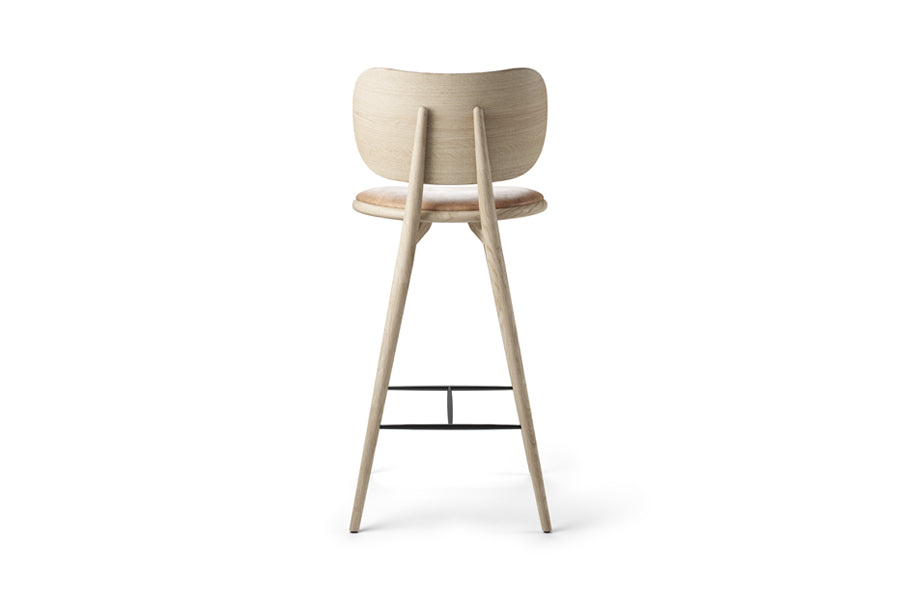 High Stool with Backrest by Mater, showing back view of high stool with backrest in natural matt lacqured oak/natural tanned leather seat.