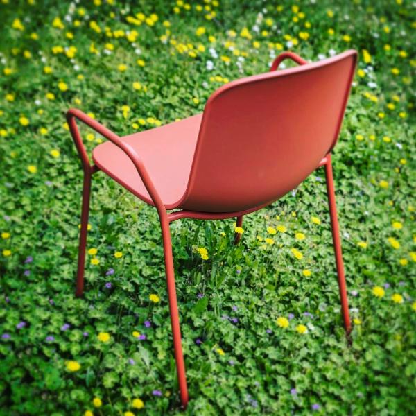 Holi Arm Chair by Toou, showing angle view of arm chair in the live shot.