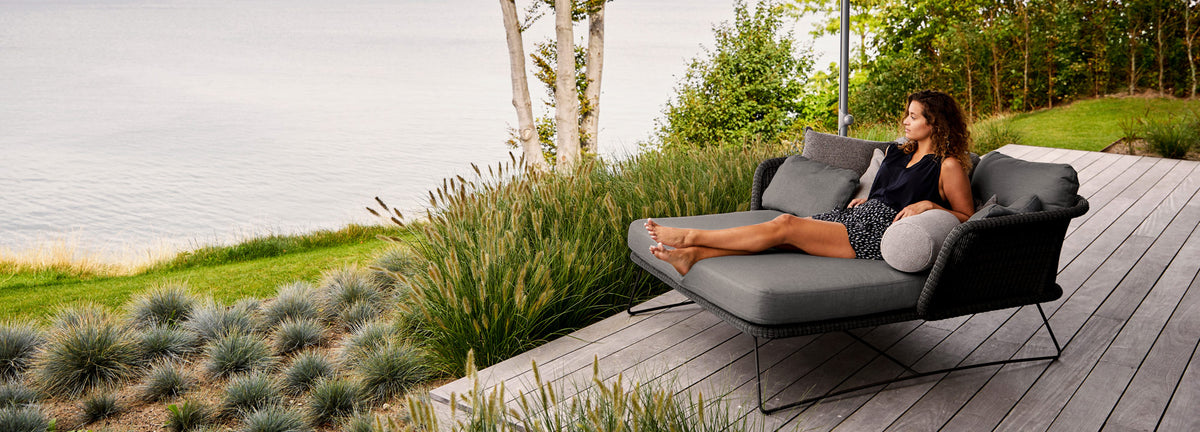 Horizon Outdoor Daybed by Cane-Line, showing horizon outdoor daybed in live shot.