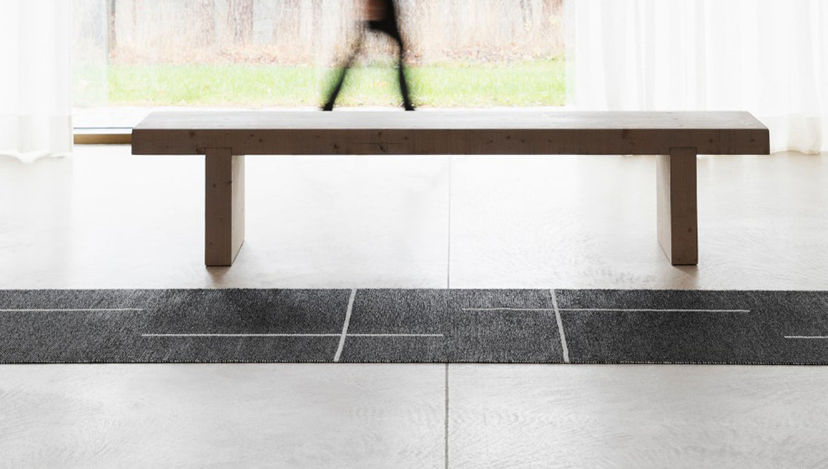 Fred Black & Vanilla Runner Rug by Pappelina, showing fred black & vanilla runner rug in live shot.