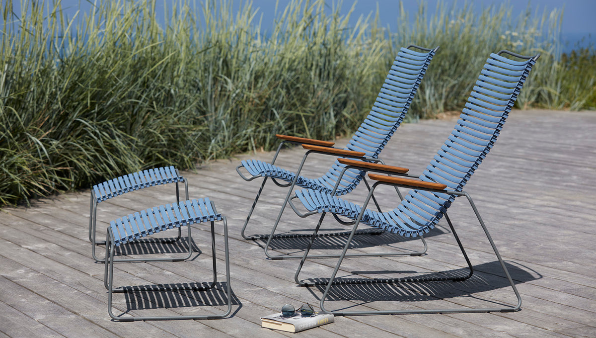 Click Footrest by Houe, showing click footrest with lounge chair in live shot.