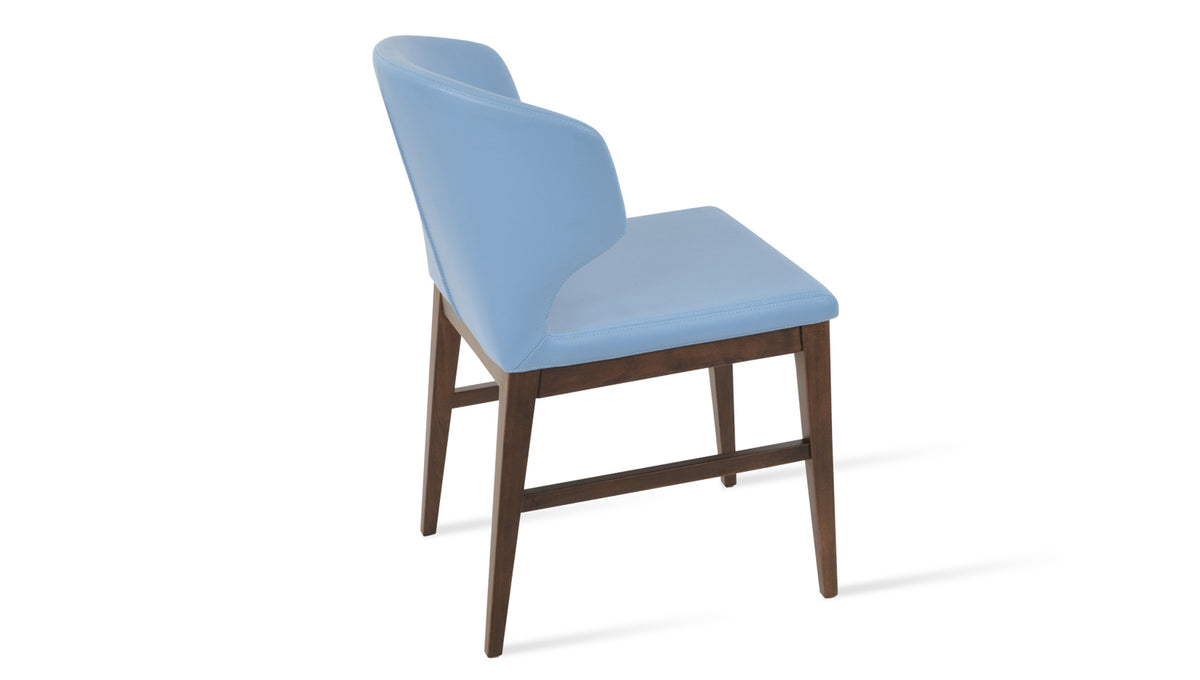 Amed Wood Stretcher Dining Chair by SohoConcept, showing side view of amed wood stretcher dining chair.