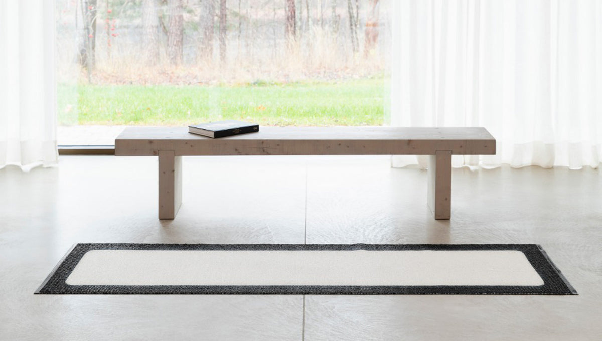 Ilda Black & Vanilla Runner Rug by Pappelina, showing ilda black & vanilla runner rug in live shot.