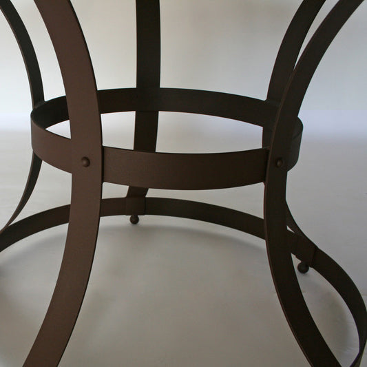 James De Wulf Hourglass Cage Dining Table by De Wulf, showing closeup view of hourglass cage dining table in live shot.