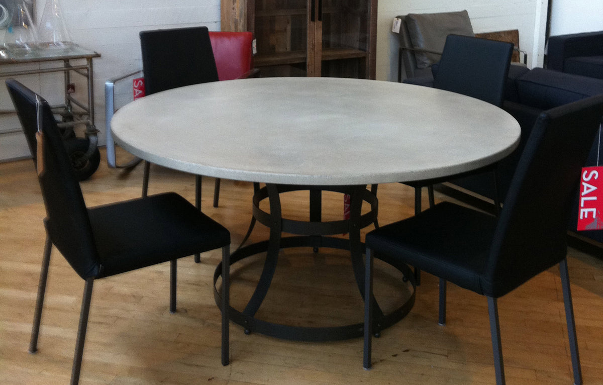 James De Wulf Hourglass Cage Dining Table by De Wulf, showing hourglass cage dining table with chairs in live shot.