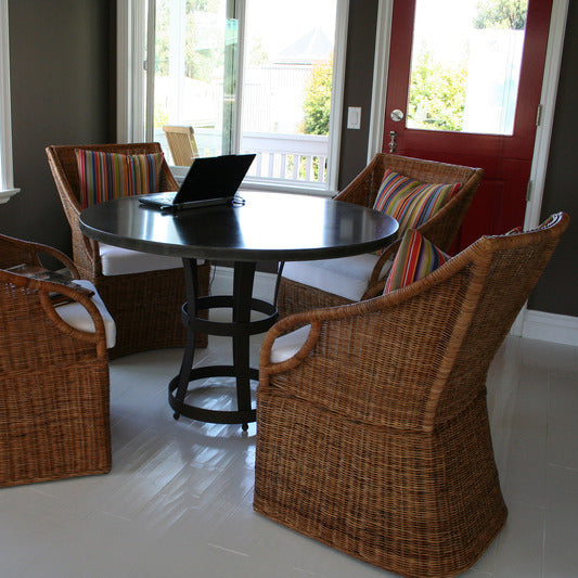 James De Wulf Hourglass Cage Dining Table by De Wulf, showing hourglass cage dining table with chairs in live shot.