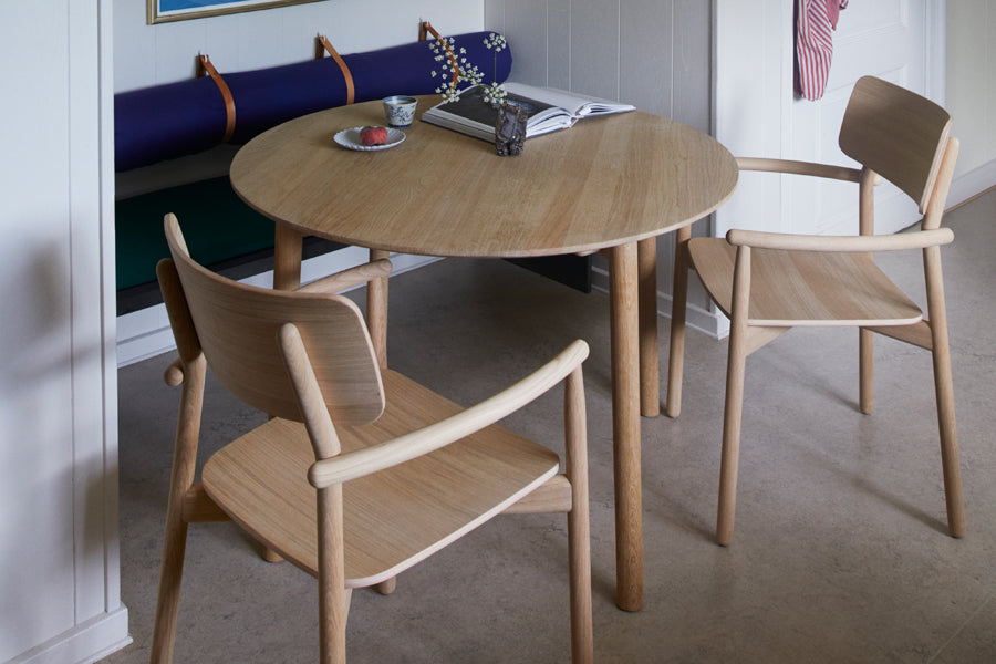 Hven Table by Skagerak, showing hven table with chairs in live shot.
