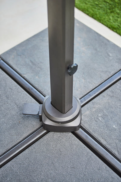 Hyde Luxe Parasol by Cane-Line, showing base of hyde luxe parasol in live shot.