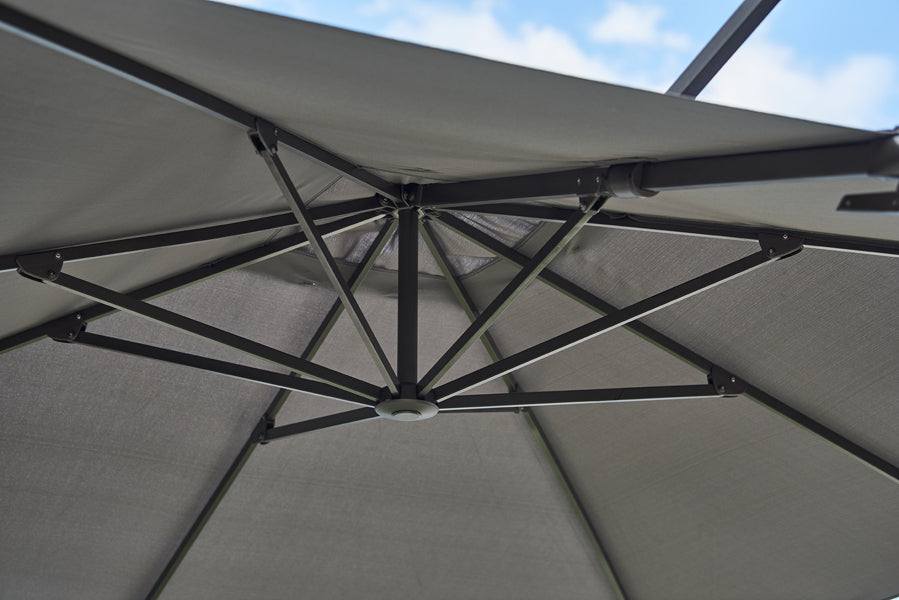 Hyde Luxe Parasol by Cane-Line, showing closeup view of hyde luxe parasol in live shot.