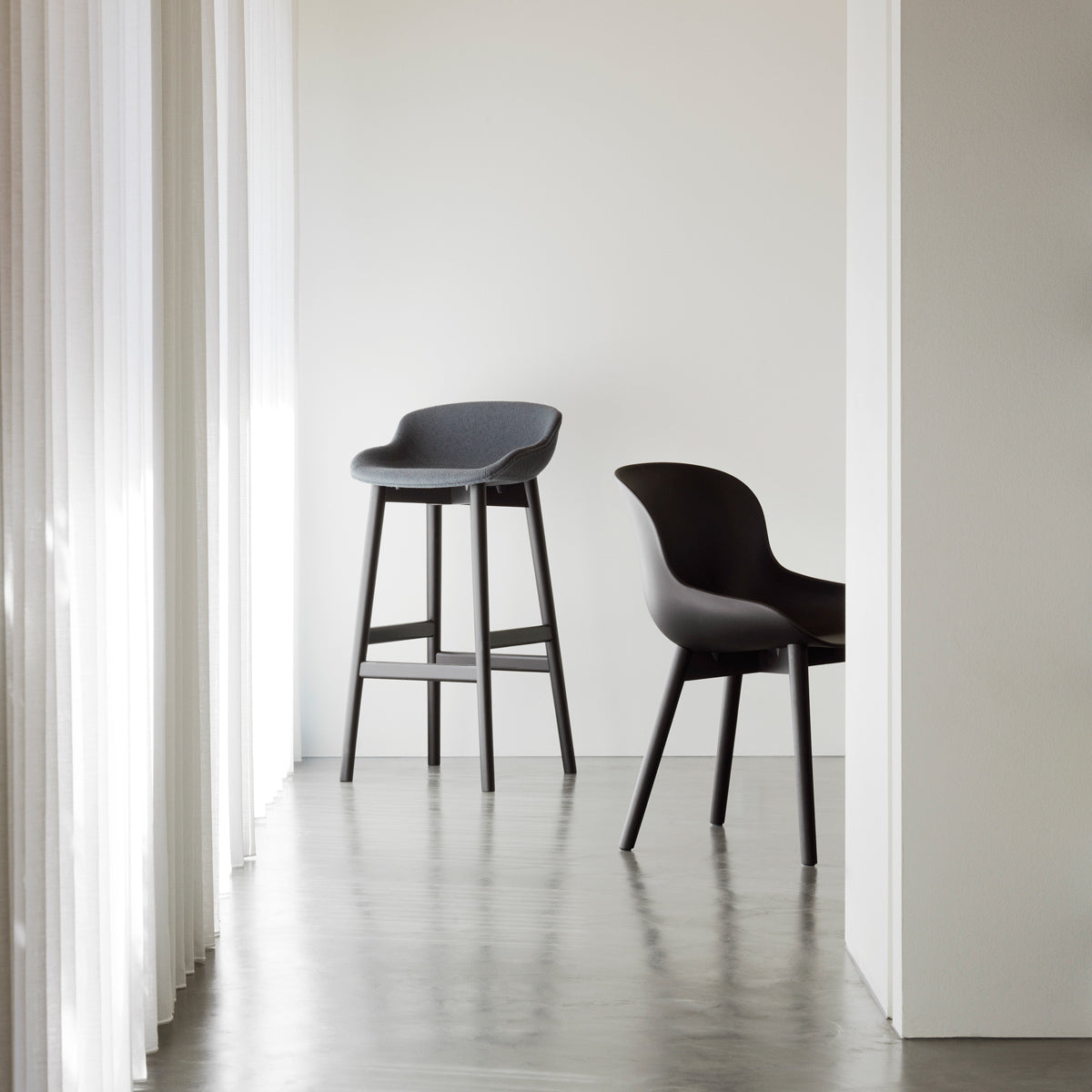 Hyg Chair by Normann Copenhagen, showing hyg chair in live shot.