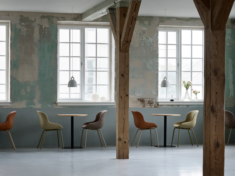 Hyg Chair by Normann Copenhagen, showing hyg chairs in live shot.