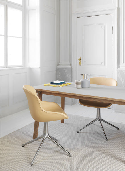 Hyg Swivel Chair by Normann Copenhagen, showing hyg swivel chairs in live shot.