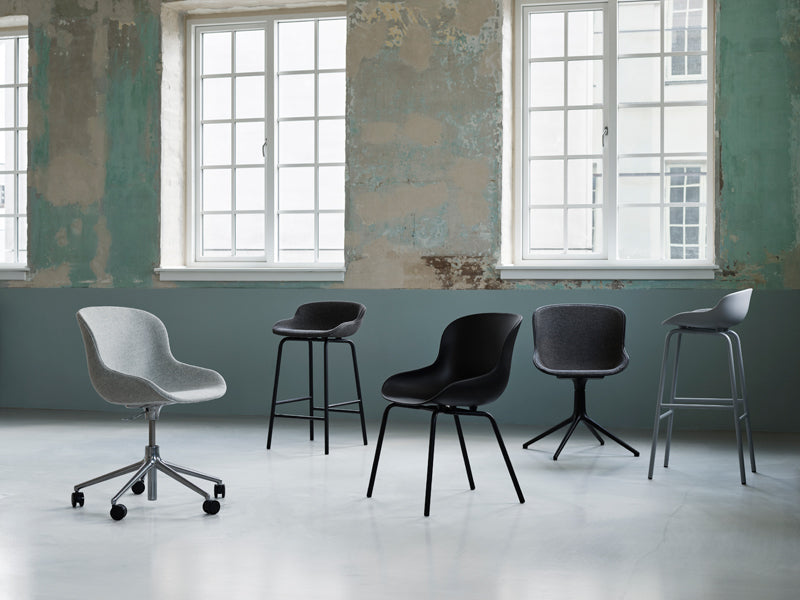 Hyg Swivel Chair by Normann Copenhagen, showing hyg swivel chair in live shot.